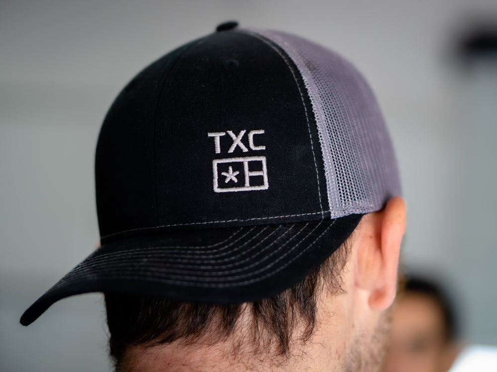 
                  
                    TXC Trucker Hat
                  
                
