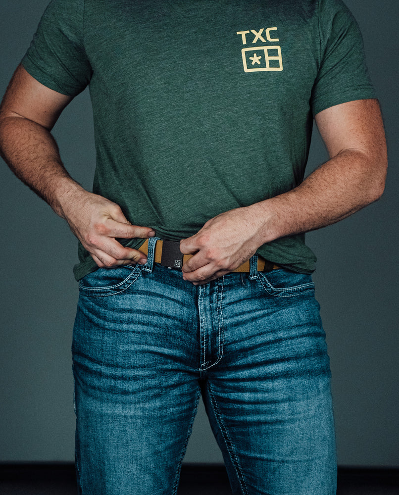
                  
                    Olive T-shirt with Tan logo
                  
                